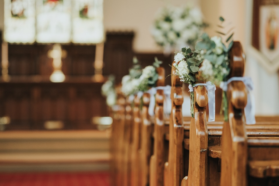 Floral arrangement down isle