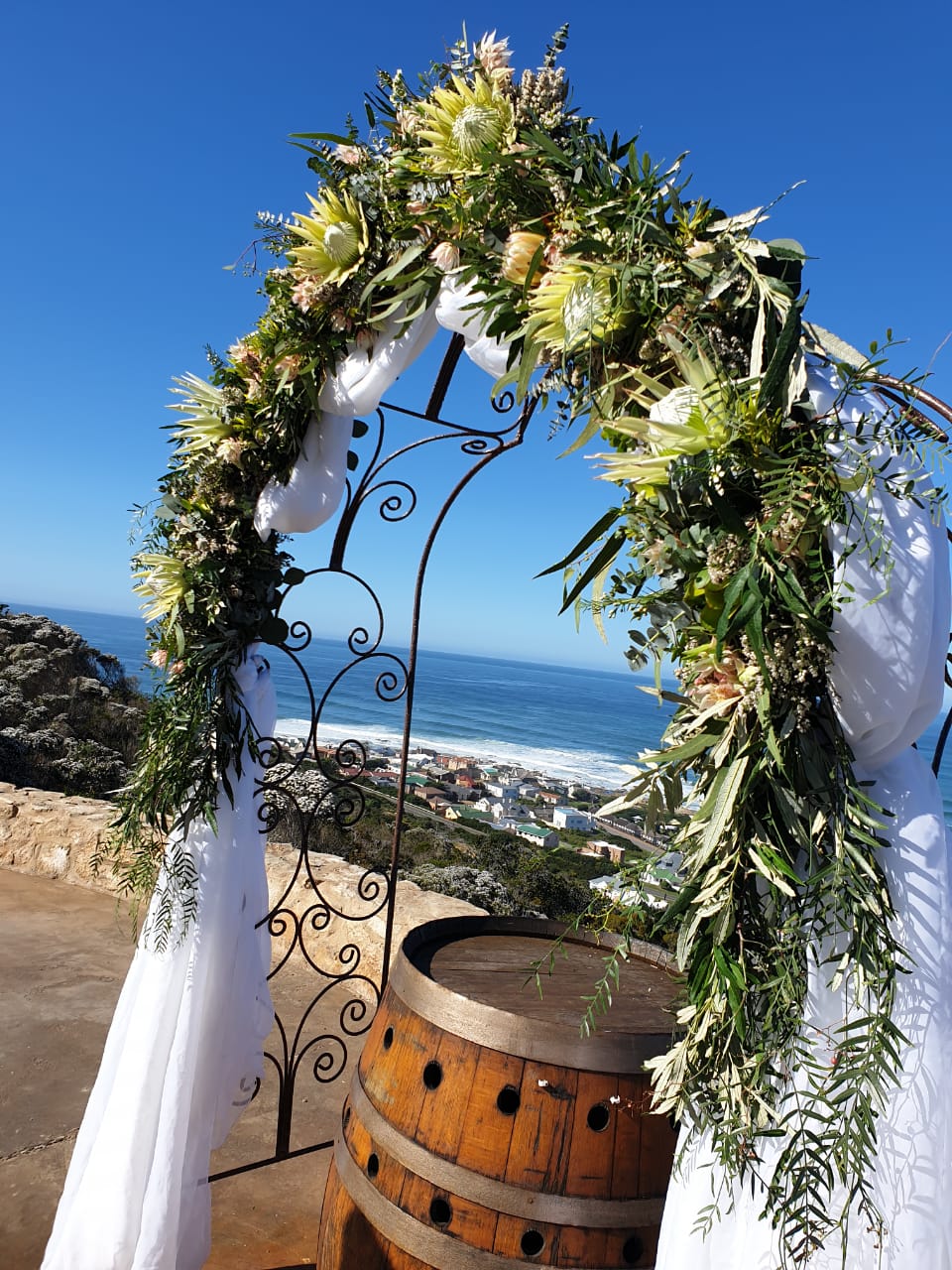 Arch with floral arrangement