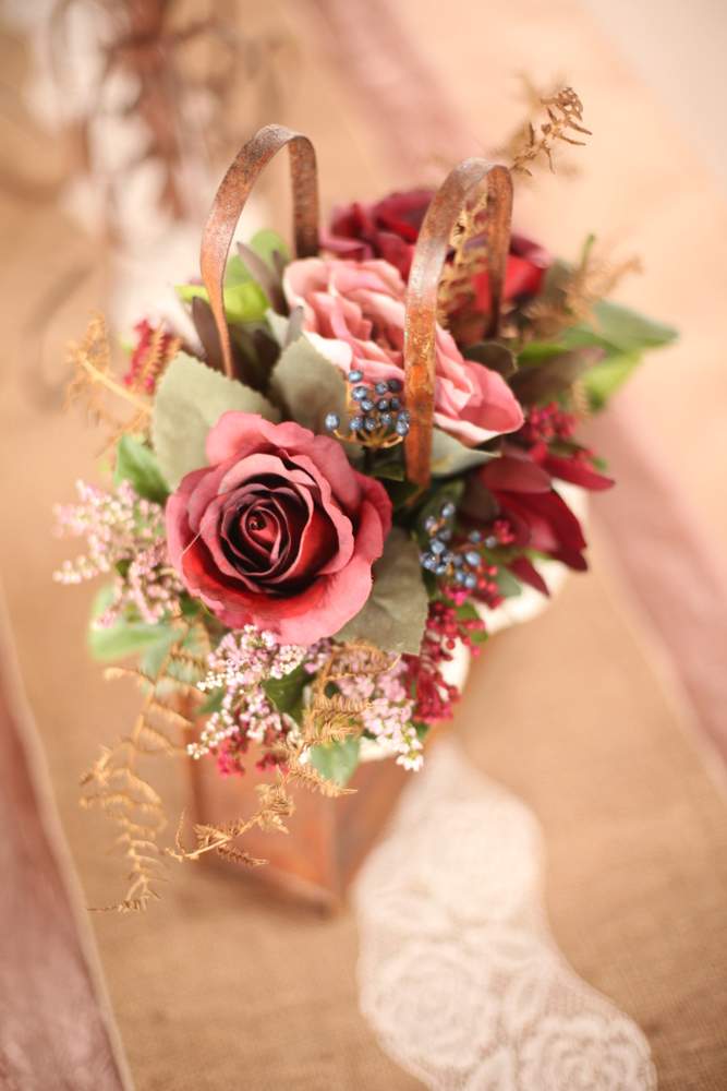 Floral arrangment in Rustic Handbag tin